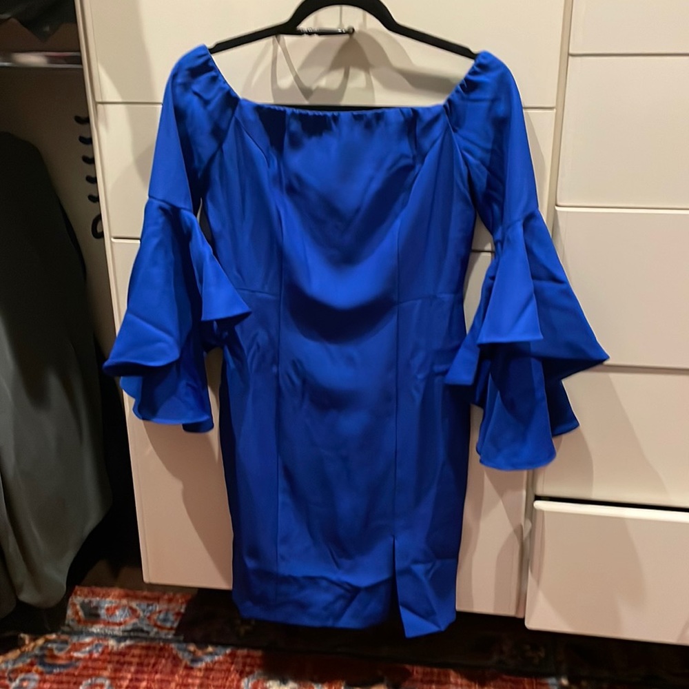 Dark blue cocktail dress. Off the shoulders. Brand new with tags.